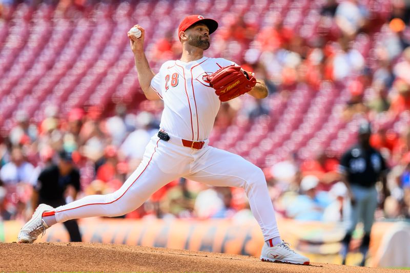 May 15, 2025; Cincinnati, Ohio, USA; Cincinnati Reds starting pitcher Nick Martinez (28) pitches against the Chicago White Sox in the first inning at Great American Ball Park. Mandatory Credit: Katie Stratman-Imagn Images