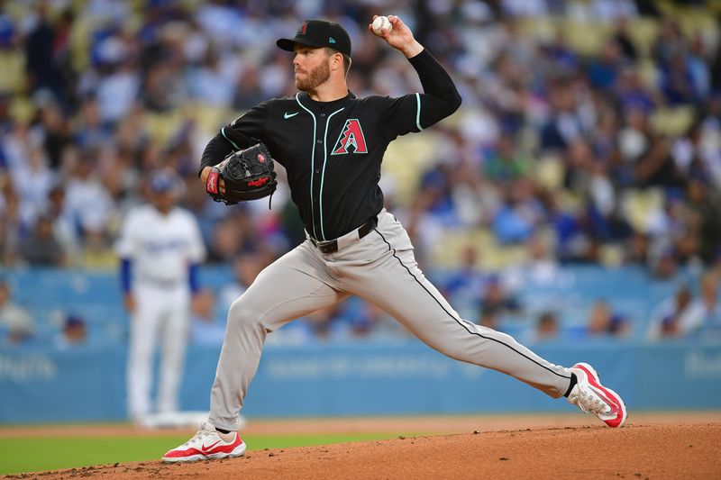 May 22, 2024; Los Angeles, California, USA; Arizona Diamondbacks pitcher Brandon Hughes (56) throws against the Los Angeles Dodgers during the first inning at Dodger Stadium. Mandatory Credit: Gary A. Vasquez-USA TODAY Sports