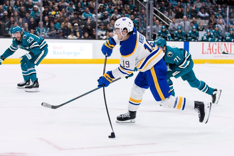 Nov 23, 2024; San Jose, California, USA; Buffalo Sabres center Peyton Krebs (19) shoots and scores against the San Jose Sharks during the first period at SAP Center in San Jose. Mandatory Credit: John Hefti-Imagn Images