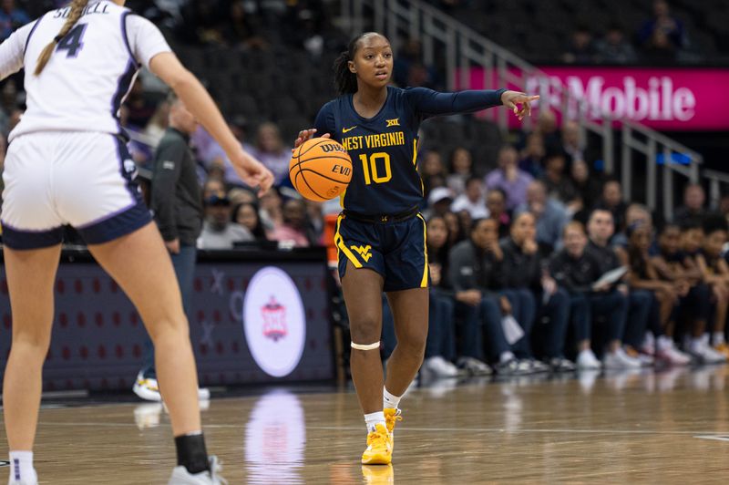 Mar 9, 2024; Kansas City, MO, USA; West Virginia Mountaineers guard Jordan Harrison (10) handles the ball against the Kansas State Wildcats during the first half at T-Mobile Center. Mandatory Credit: Amy Kontras-USA TODAY Sports