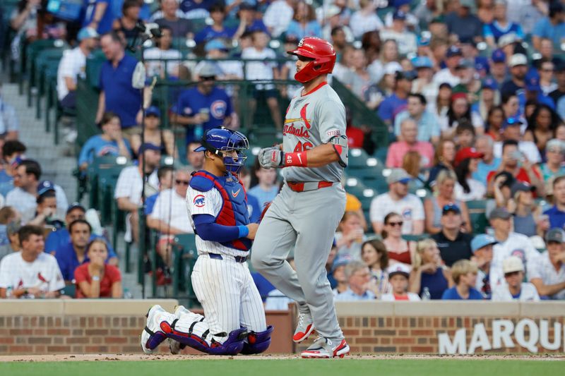 Aug 1, 2024; Chicago, Illinois, USA; St. Louis Cardinals first baseman Paul Goldschmidt (46) crosses home plate after hitting a solo home run against the Chicago Cubs during the first inning at Wrigley Field. Mandatory Credit: Kamil Krzaczynski-USA TODAY Sports