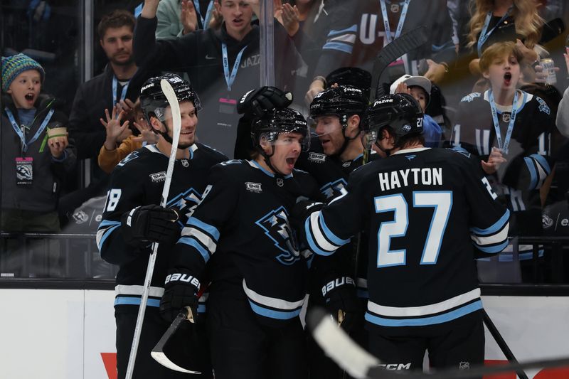 Oct 17, 2025; Salt Lake City, Utah, USA; Utah Mammoth right wing Clayton Keller (9) celebrates a goal against the San Jose Sharks during the third period at Delta Center. Mandatory Credit: Rob Gray-Imagn Images