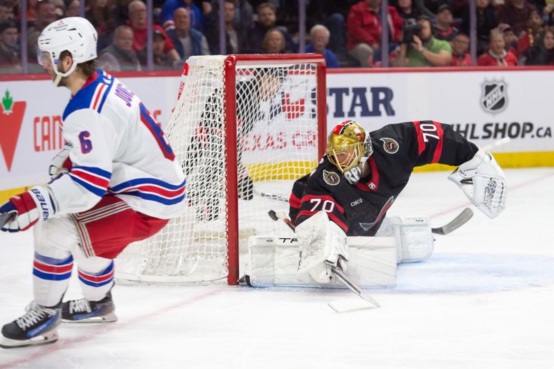 Jan 27, 2024; Ottawa, Ontario, CAN; New York Rangers defenseman Zac Jones (6) scores against Ottawa Senators goalie Joonas Korpisalo (70) in the second period at the Canadian Tire Centre. Mandatory Credit: Marc DesRosiers-USA TODAY Sports