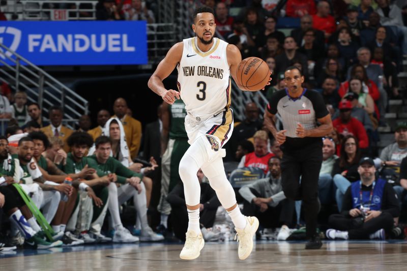 NEW ORLEANS, LA - MARCH 28: CJ McCollum #3 of the New Orleans Pelicans handles the ball during the game  on March 28, 2024 at the Smoothie King Center in New Orleans, Louisiana. NOTE TO USER: User expressly acknowledges and agrees that, by downloading and or using this Photograph, user is consenting to the terms and conditions of the Getty Images License Agreement. Mandatory Copyright Notice: Copyright 2024 NBAE (Photo by Layne Murdoch Jr./NBAE via Getty Images)