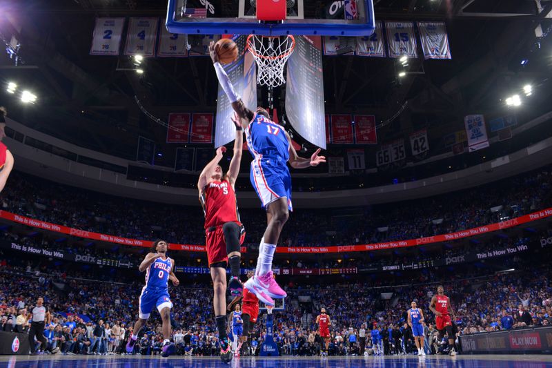 PHILADELPHIA, PA - APRIL 17: Buddy Heild #17 of the Philadelphia 76ers drives to the basket during the game against the Miami Heat during the 2024 NBA Play-In Tournament on April 17, 2024 at the Wells Fargo Center in Philadelphia, Pennsylvania NOTE TO USER: User expressly acknowledges and agrees that, by downloading and/or using this Photograph, user is consenting to the terms and conditions of the Getty Images License Agreement. Mandatory Copyright Notice: Copyright 2024 NBAE (Photo by Jesse D. Garrabrant/NBAE via Getty Images)