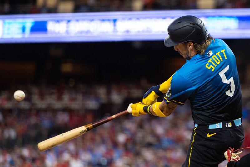 Jul 26, 2024; Philadelphia, Pennsylvania, USA; Philadelphia Phillies second base Bryson Stott (5) hits a home run during the fifth inning against the Cleveland Guardians at Citizens Bank Park. Mandatory Credit: Bill Streicher-USA TODAY Sports