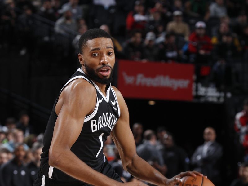 PORTLAND, OR - JANUARY 17: Mikal Bridges #1 of the Brooklyn Nets dribbles the ball during the game against the Portland Trail Blazers on January 17, 2024 at the Moda Center Arena in Portland, Oregon. NOTE TO USER: User expressly acknowledges and agrees that, by downloading and or using this photograph, user is consenting to the terms and conditions of the Getty Images License Agreement. Mandatory Copyright Notice: Copyright 2024 NBAE (Photo by Cameron Browne/NBAE via Getty Images)