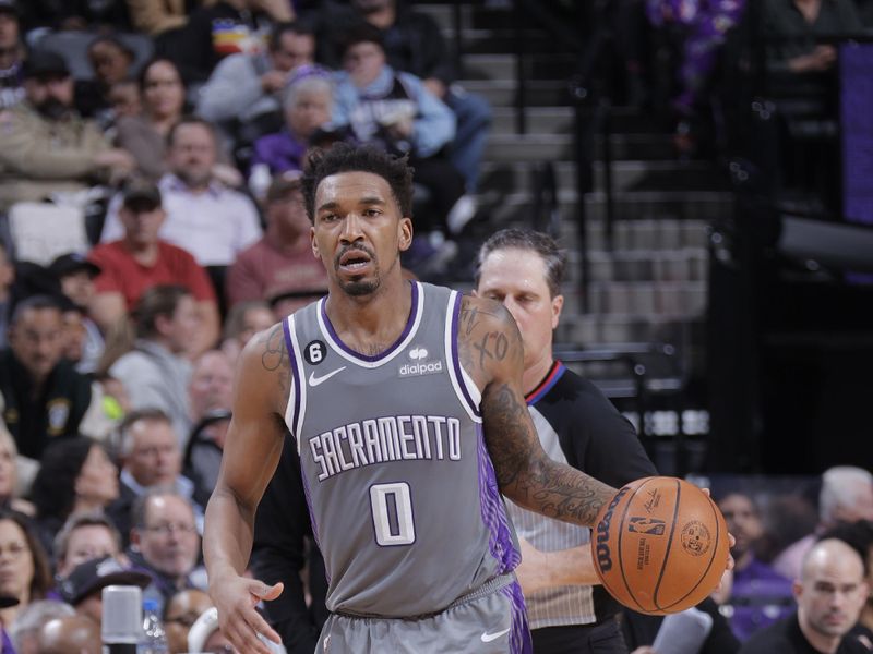 SACRAMENTO, CA - MARCH 9: Malik Monk #0 of the Sacramento Kings dribbles the ball during the game against the New York Knicks on March 9, 2023 at Golden 1 Center in Sacramento, California. NOTE TO USER: User expressly acknowledges and agrees that, by downloading and or using this Photograph, user is consenting to the terms and conditions of the Getty Images License Agreement. Mandatory Copyright Notice: Copyright 2023 NBAE (Photo by Rocky Widner/NBAE via Getty Images)