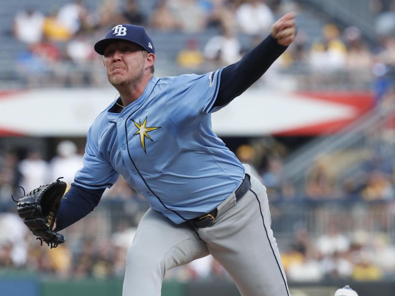 Jun 22, 2024; Pittsburgh, Pennsylvania, USA;  Tampa Bay Rays relief pitcher Garrett Cleavinger (60) pitches against the Pittsburgh Pirates during the eighth inning at PNC Park. The Pirates won 4-3. Mandatory Credit: Charles LeClaire-USA TODAY Sports