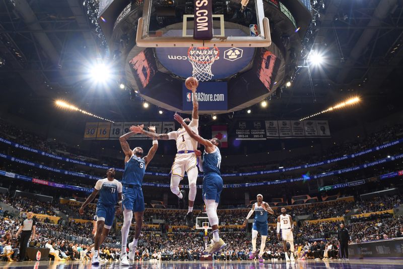 LOS ANGELES, CA - MARCH 10: D'Angelo Russell #1 of the Los Angeles Lakers drives to the basket during the game against the Minnesota Timberwolves on March 10, 2024 at Crypto.Com Arena in Los Angeles, California. NOTE TO USER: User expressly acknowledges and agrees that, by downloading and/or using this Photograph, user is consenting to the terms and conditions of the Getty Images License Agreement. Mandatory Copyright Notice: Copyright 2024 NBAE (Photo by Adam Pantozzi/NBAE via Getty Images)