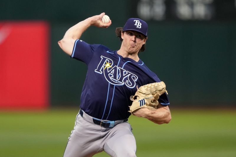 Aug 21, 2024; Oakland, California, USA; Tampa Bay Rays starting pitcher Ryan Pepiot (44) throws a pitch against the Oakland Athletics during the fifth inning at Oakland-Alameda County Coliseum. Mandatory Credit: Darren Yamashita-USA TODAY Sports