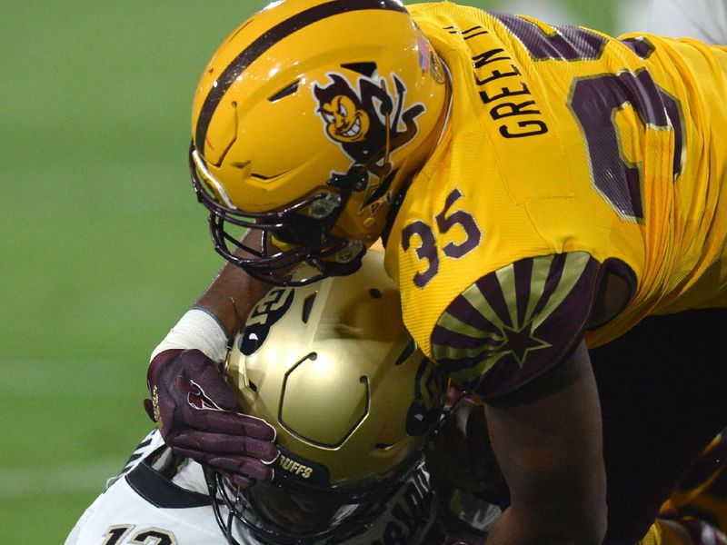 Sep 25, 2021; Tempe, Arizona, USA; Arizona State Sun Devils defensive lineman B.J. Green II (35) sacks Colorado Buffaloes quarterback Brendon Lewis (12) during the first half at Sun Devil Stadium. Mandatory Credit: Joe Camporeale-USA TODAY Sports