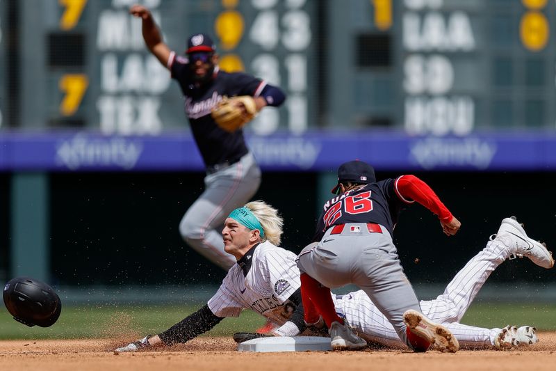 Apr 20, 2025; Denver, Colorado, USA; Colorado Rockies right fielder Zac Veen (13) safely steals second against Washington Nationals shortstop Nasim Nunez (26) in the fifth inning at Coors Field. Mandatory Credit: Isaiah J. Downing-Imagn Images