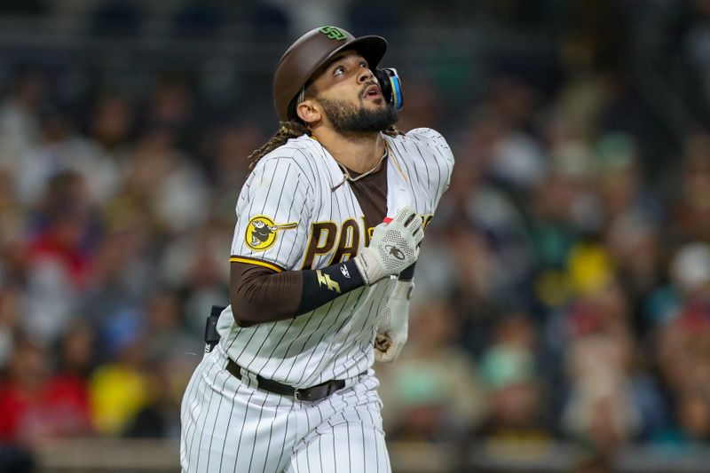 May 20, 2023; San Diego, California, USA;  San Diego Padres right fielder Fernando Tatis Jr. (23) watches the ball as he fouls out to right field in eighth inning against the Boston Red Sox at Petco Park. Mandatory Credit: David Frerker-USA TODAY Sports