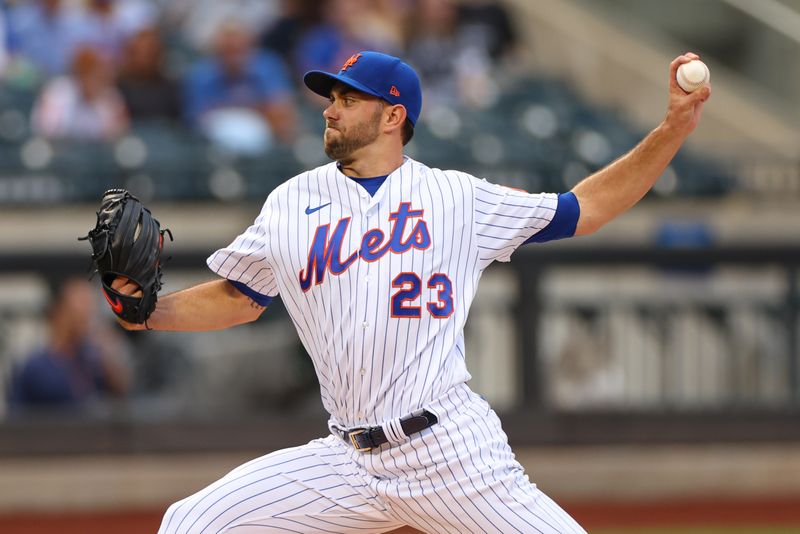 Jun 27, 2023; New York City, New York, USA; New York Mets starting pitcher David Peterson (23) delivers a pitch during the first inning against the Milwaukee Brewers at Citi Field. Mandatory Credit: Vincent Carchietta-USA TODAY Sports