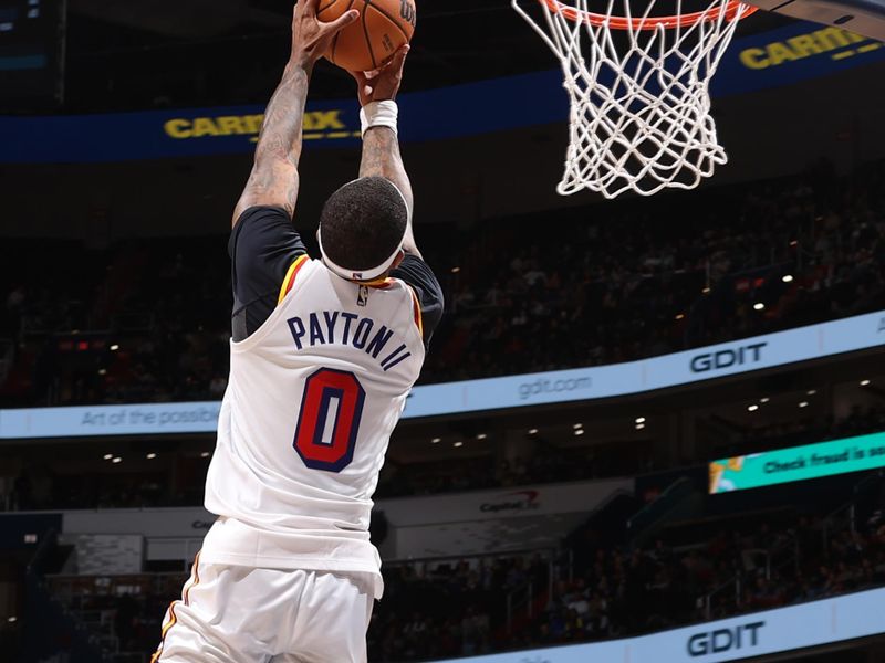 WASHINGTON, DC -? NOVEMBER 04: Gary Payton II #0 of the Golden State Warriors dunks the ball during the game against the Washington Wizards  on November 04 2024 at Capital One Arena in Washington, DC. NOTE TO USER: User expressly acknowledges and agrees that, by downloading and or using this Photograph, user is consenting to the terms and conditions of the Getty Images License Agreement. Mandatory Copyright Notice: Copyright 2024 NBAE (Photo by Kenny Giarla/NBAE via Getty Images)