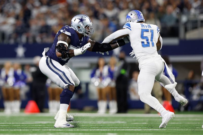 Dallas Cowboys offensive linesman Tyron Smith (77) looks to block against Bruce Irvin (51) during an NFL football game against the Detroit Lions, Saturday, Dec. 30, 2023, in Arlington, Texas. (AP Photo/Matt Patterson)