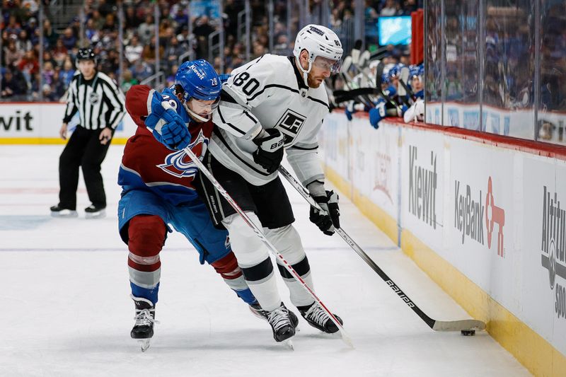 Jan 26, 2024; Denver, Colorado, USA; Colorado Avalanche left wing Miles Wood (28) and Los Angeles Kings center Pierre-Luc Dubois (80) battle for the puck in the first period at Ball Arena. Mandatory Credit: Isaiah J. Downing-USA TODAY Sports