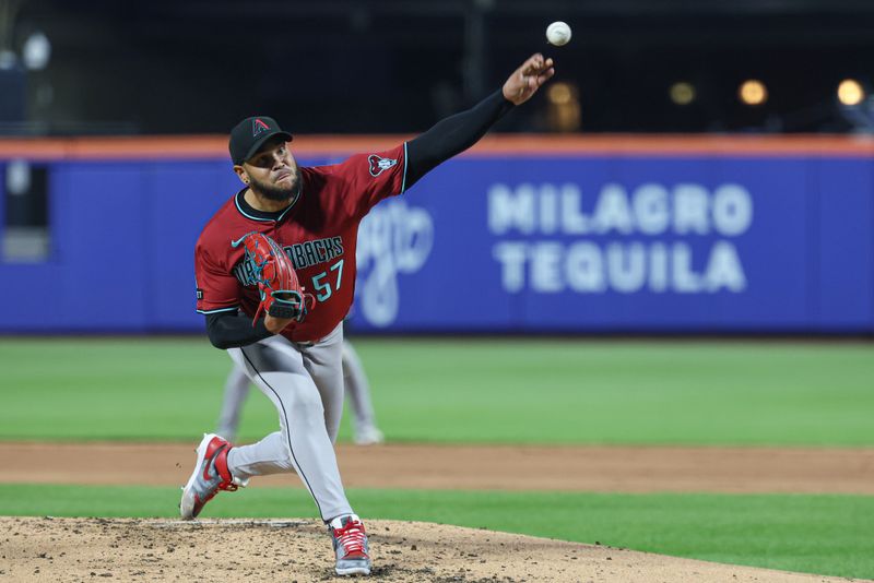 Apr 29, 2025; New York City, New York, USA; Arizona Diamondbacks starting pitcher Eduardo Rodriguez (57) delivers a pitch during the third inning against the New York Mets at Citi Field. Mandatory Credit: Vincent Carchietta-Imagn Images