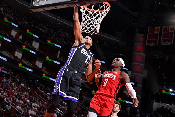 HOUSTON, TX - NOVEMBER 6: Keegan Murray #13 of the Sacramento Kings dunks the ball during the game against the Houston Rockets on November 6, 2023 at the Toyota Center in Houston, Texas. NOTE TO USER: User expressly acknowledges and agrees that, by downloading and or using this photograph, User is consenting to the terms and conditions of the Getty Images License Agreement. Mandatory Copyright Notice: Copyright 2023 NBAE (Photo by Logan Riely/NBAE via Getty Images)