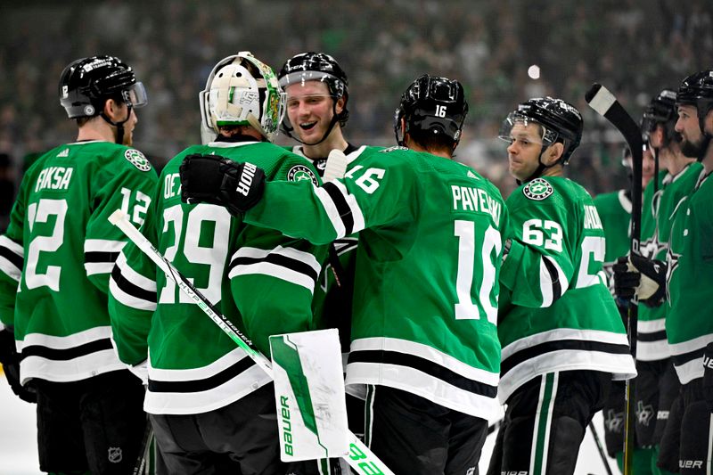 Apr 17, 2024; Dallas, Texas, USA; Dallas Stars goaltender Jake Oettinger (29) and center Joe Pavelski (16) and right wing Evgenii Dadonov (63) and center Radek Faksa (12) celebrates after the Stars defeat the St. Louis Blues during the overtime shootout at the American Airlines Center. Mandatory Credit: Jerome Miron-USA TODAY Sports