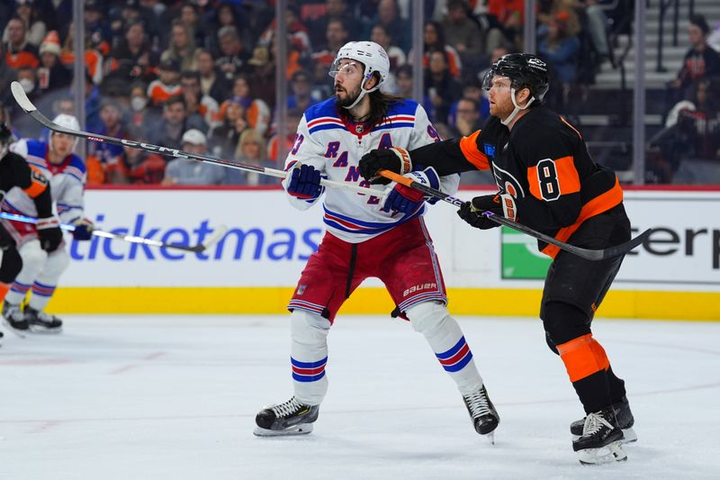 Nov 29, 2024; Philadelphia, Pennsylvania, USA; New York Rangers center Mika Zibanejad (93) battles for position against Philadelphia Flyers defenseman Cam York (8) in the second period at Wells Fargo Center. Mandatory Credit: Kyle Ross-Imagn Images