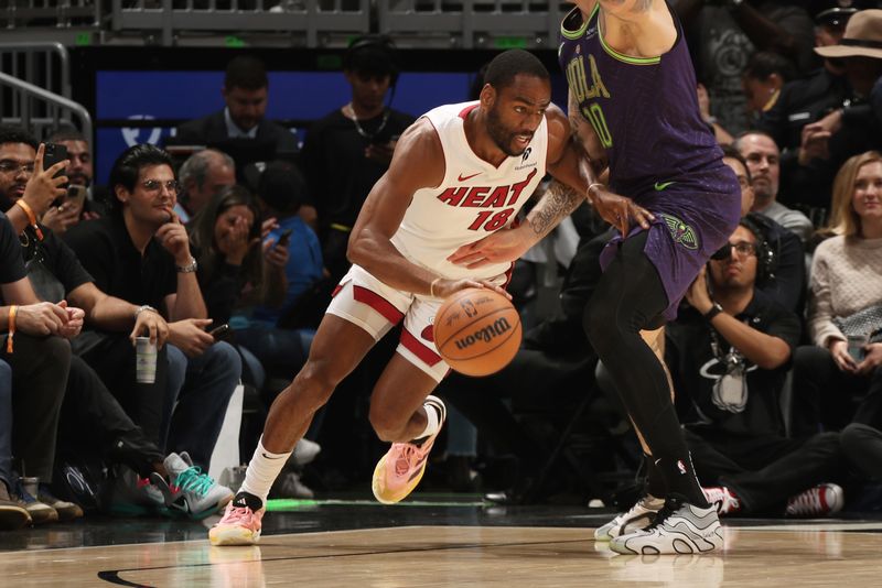 MIAMI, FL - OCTOBER 22: Alec Burks #18 of the Miami Heat drives to the basket during the game against the New Orleans Pelicans on January 1, 2025 at Kaseya Center in Miami, Florida. NOTE TO USER: User expressly acknowledges and agrees that, by downloading and or using this Photograph, user is consenting to the terms and conditions of the Getty Images License Agreement. Mandatory Copyright Notice: Copyright 2025 NBAE (Photo by Issac Baldizon/NBAE via Getty Images)