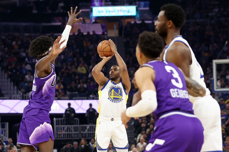 SAN FRANCISCO, CALIFORNIA - APRIL 14:  Chris Paul #3 of the Golden State Warriors shoots over Taylor Hendricks #0 of the Utah Jazz at Chase Center on April 14, 2024 in San Francisco, California. NOTE TO USER: User expressly acknowledges and agrees that, by downloading and or using this photograph, User is consenting to the terms and conditions of the Getty Images License Agreement.  (Photo by Ezra Shaw/Getty Images)