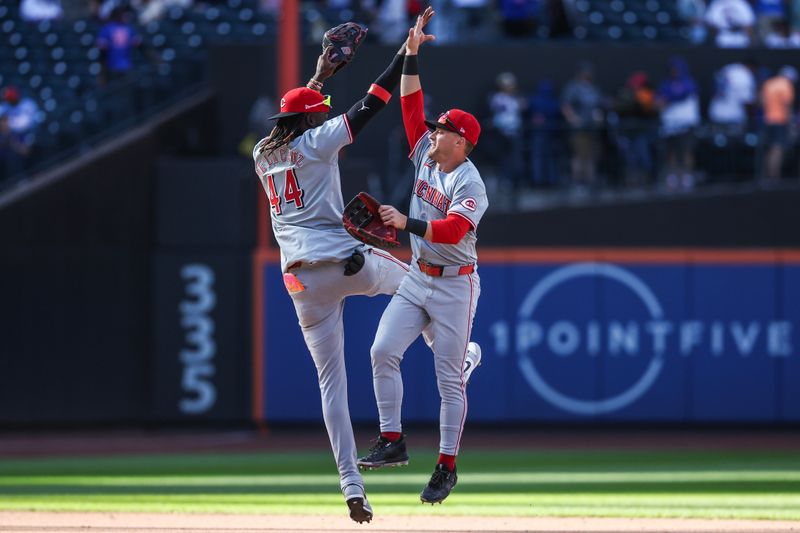 Sep 8, 2024; New York City, New York, USA;  Cincinnati Reds shortstop Elly De La Cruz (44) and center fielder TJ Friedl (29) celebrate after defeating the New York Mets 3-1 at Citi Field. Mandatory Credit: Wendell Cruz-Imagn Images