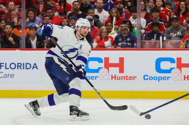 Apr 21, 2024; Sunrise, Florida, USA; Tampa Bay Lightning defenseman Victor Hedman (77) moves the puck against the Florida Panthers during the second period in game one of the first round of the 2024 Stanley Cup Playoffs at Amerant Bank Arena. Mandatory Credit: Sam Navarro-USA TODAY Sports