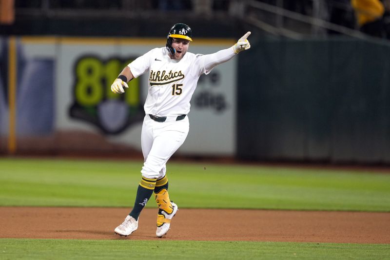 Sep 6, 2024; Oakland, California, USA; Oakland Athletics left fielder Seth Brown (15) reacts after hitting a walk-off single against the Detroit Tigers during the thirteenth inning at Oakland-Alameda County Coliseum. Mandatory Credit: Darren Yamashita-Imagn Images