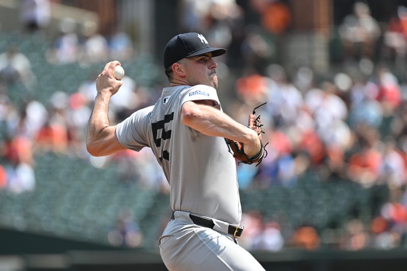 Jul 14, 2024; Baltimore, Maryland, USA;  New York Yankees pitcher Carlos Rodón (55) delivers a first inning pitch against the Baltimore Orioles at Oriole Park at Camden Yards. Mandatory Credit: James A. Pittman-USA TODAY Sports