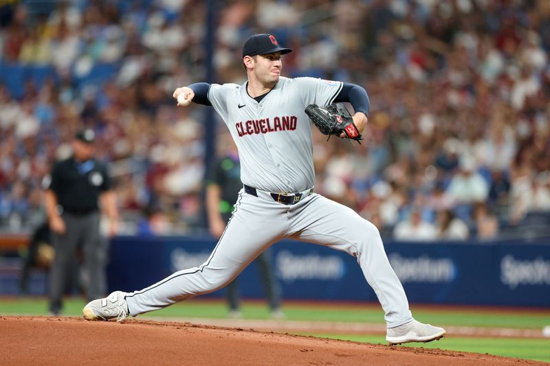 Jul 13, 2024; St. Petersburg, Florida, USA; Cleveland Guardians pitcher Gavin Williams (32) throws a pitch against the Tampa Bay Rays in the first inning at Tropicana Field. Mandatory Credit: Nathan Ray Seebeck-USA TODAY Sports