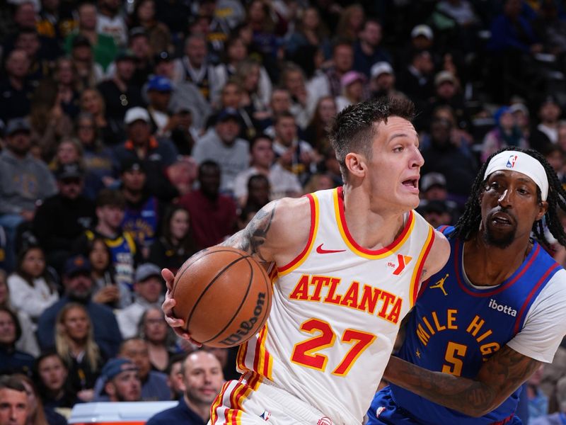 DENVER, CO - APRIL 6: Vit Krejci #27 of the Atlanta Hawks dribbles the ball during the game against the Denver Nuggets on April 6, 2024 at the Ball Arena in Denver, Colorado. NOTE TO USER: User expressly acknowledges and agrees that, by downloading and/or using this Photograph, user is consenting to the terms and conditions of the Getty Images License Agreement. Mandatory Copyright Notice: Copyright 2024 NBAE (Photo by Garrett Ellwood/NBAE via Getty Images)