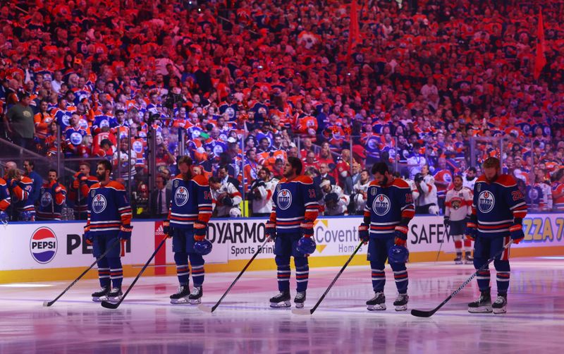 June 21, 2024; Edmonton, Alberta, CAN; Edmonton Oilers players line up for the national anthems before playing against the Florida Panthers in game six of the 2024 Stanley Cup Final at Rogers Place. Mandatory Credit: Sergei Belski-USA TODAY Sports