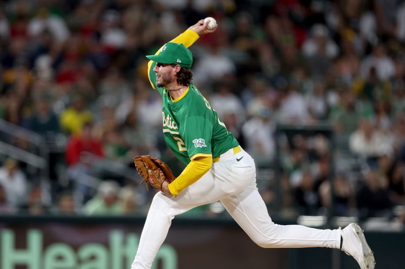 May 19, 2025; West Sacramento, California, USA; Athletics pitcher Mitch Spence (28) delivers a pitch against the Los Angeles Angels during the fifth inning at Sutter Health Park. Mandatory Credit: Dennis Lee-Imagn Images