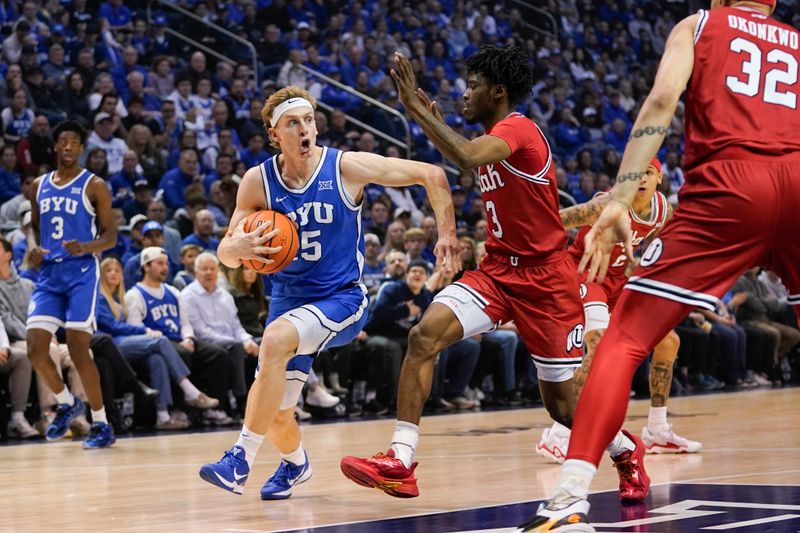Jan 24, 2026; Provo, Utah, USA; BYU Cougars guard Richie Saunders (15) drives to the basket during the first half against the Utah Utes at Marriott Center. Mandatory Credit: Aaron Baker-Imagn Images 