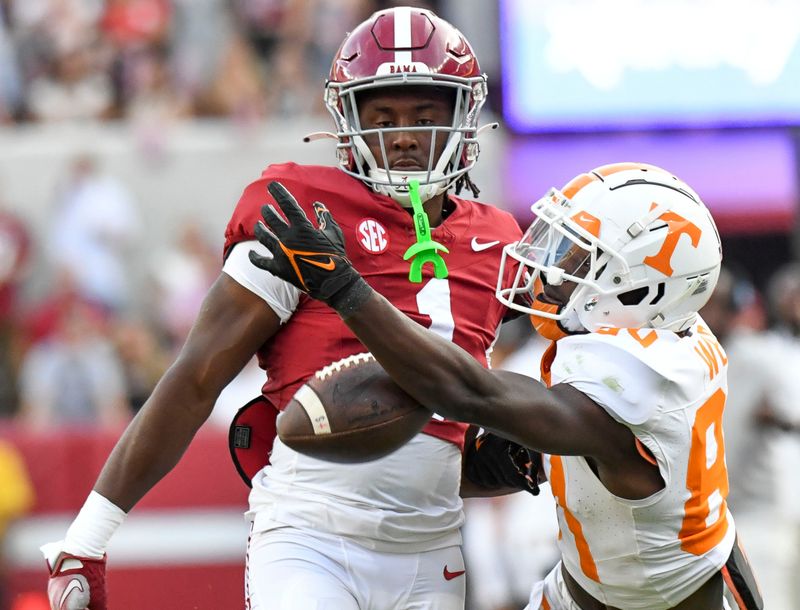 Oct 21, 2023; Tuscaloosa, Alabama, USA;  Alabama Crimson Tide defensive back Kool-Aid McKinstry (1) defends on a pass intended for Tennessee wide receiver Kaleb Webb (80) at Bryant-Denny Stadium. Alabama defeated Tennessee 34-20. Mandatory Credit: Gary Cosby Jr.-USA TODAY Sports