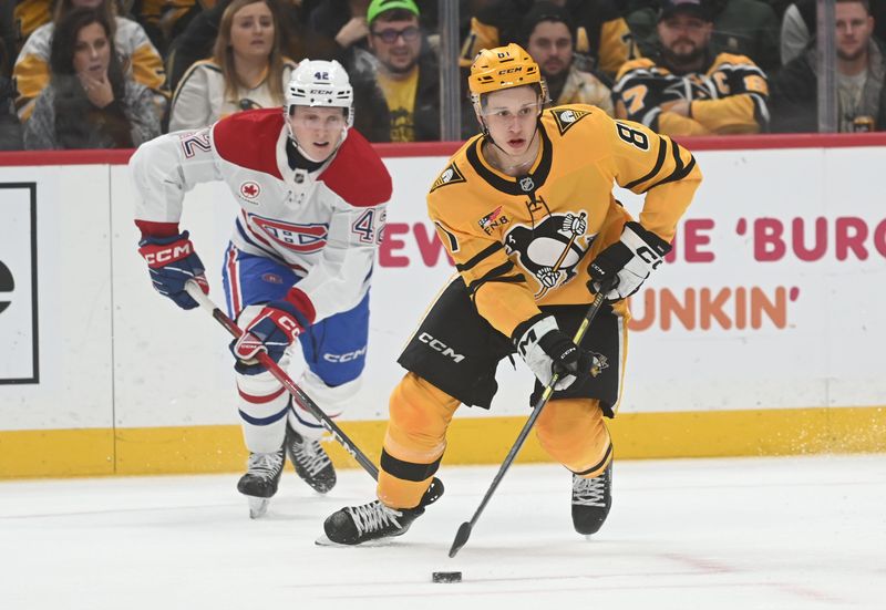 Dec 11, 2025; Pittsburgh, Pennsylvania, USA;  Pittsburgh Penguins center Ben Kindel (81) skates from Montreal Canadiens defenseman Adam Engstrom (42)  during the third period at PPG Paints Arena. The Canadiens won 4-2.  Mandatory Credit: Philip G. Pavely-Imagn Images