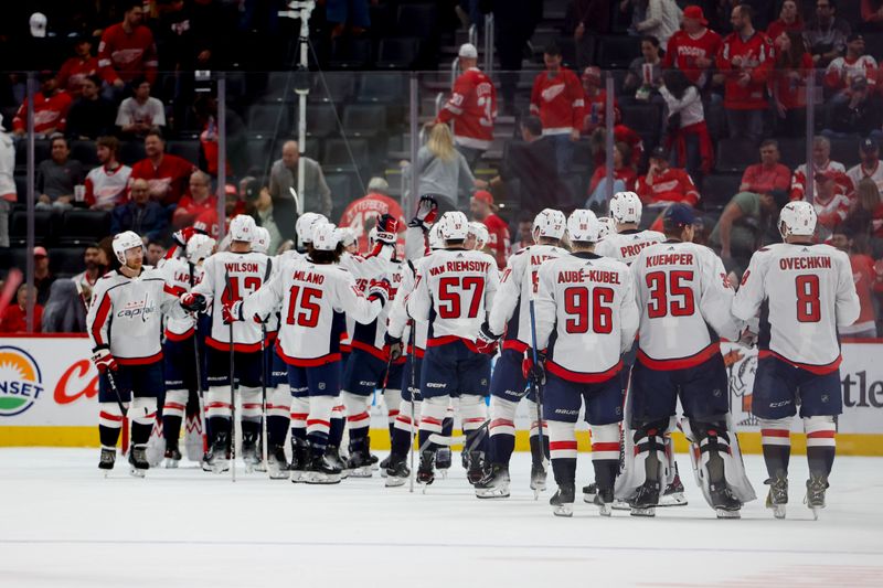 Apr 9, 2024; Detroit, Michigan, USA; Washington Capitals celebrate after defeating the Detroit Red Wings at Little Caesars Arena. Mandatory Credit: Rick Osentoski-USA TODAY Sports