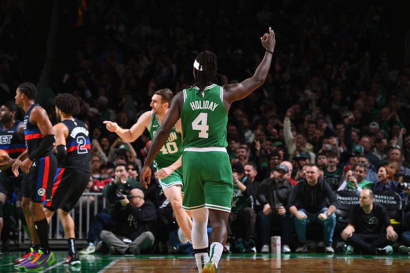 BOSTON, MA - DECEMBER 12: Jrue Holiday #4 of the Boston Celtics celebrates during the game against the Detroit Pistons on December 12, 2024 at TD Garden in Boston, Massachusetts. NOTE TO USER: User expressly acknowledges and agrees that, by downloading and/or using this Photograph, user is consenting to the terms and conditions of the Getty Images License Agreement. Mandatory Copyright Notice: Copyright 2024 NBAE (Photo by Brian Babineau/NBAE via Getty Images)