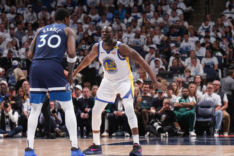 MINNEAPOLIS, MN -  MAY 8:  Draymond Green #23 of the Golden State Warriors plays defense during the game against the Minnesota Timberwolves during Round 2 Game 2 of the 2025 NBA Playoffs on May 8, 2025 at Target Center in Minneapolis, Minnesota. NOTE TO USER: User expressly acknowledges and agrees that, by downloading and or using this Photograph, user is consenting to the terms and conditions of the Getty Images License Agreement. Mandatory Copyright Notice: Copyright 2025 NBAE (Photo by Jesse D. Garrabrant/NBAE via Getty Images)