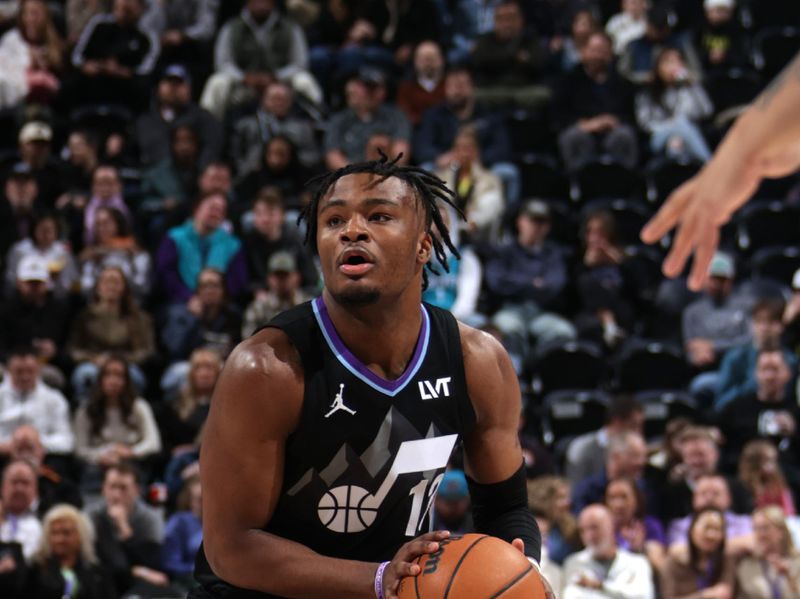 SALT LAKE CITY, UT - JANUARY 15: Isaiah Collier #13 of the Utah Jazz handles the ball during the game against the Charlotte Hornets on January 15, 2025 at Delta Center in Salt Lake City, Utah. NOTE TO USER: User expressly acknowledges and agrees that, by downloading and or using this Photograph, User is consenting to the terms and conditions of the Getty Images License Agreement. Mandatory Copyright Notice: Copyright 2025 NBAE (Photo by Melissa Majchrzak/NBAE via Getty Images)