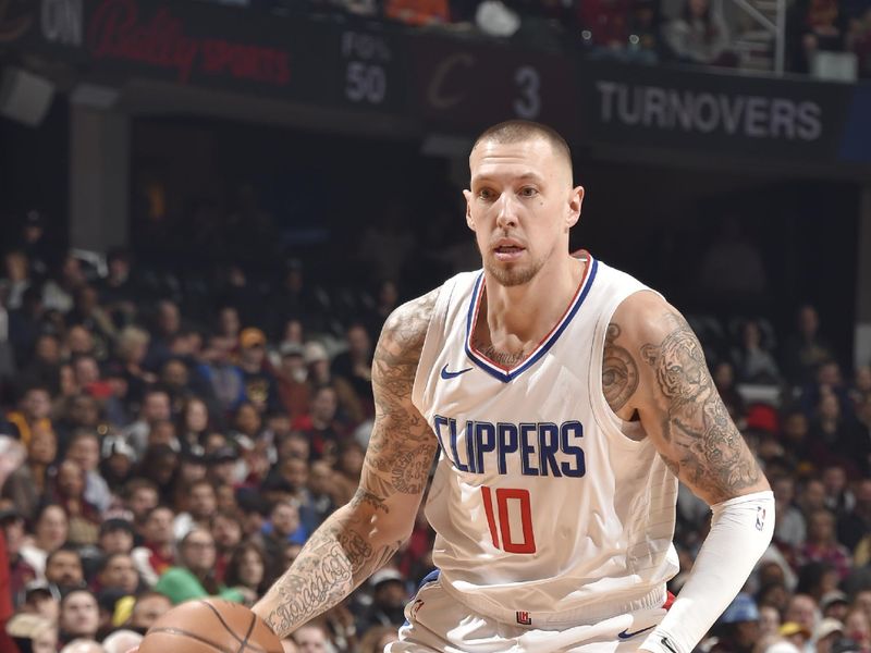 CLEVELAND, OH - JANUARY 29: Daniel Theis #10 of the LA Clippers dribbles the ball during the game against the Cleveland Cavaliers on January 29, 2024 at Rocket Mortgage FieldHouse in Cleveland, Ohio. NOTE TO USER: User expressly acknowledges and agrees that, by downloading and/or using this Photograph, user is consenting to the terms and conditions of the Getty Images License Agreement. Mandatory Copyright Notice: Copyright 2024 NBAE (Photo by David Liam Kyle/NBAE via Getty Images)