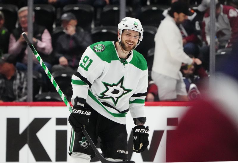 Apr 7, 2024; Denver, Colorado, USA; Dallas Stars center Tyler Seguin (91) reacts after his empty net third period goal against the Colorado Avalanche at Ball Arena. Mandatory Credit: Ron Chenoy-USA TODAY Sports