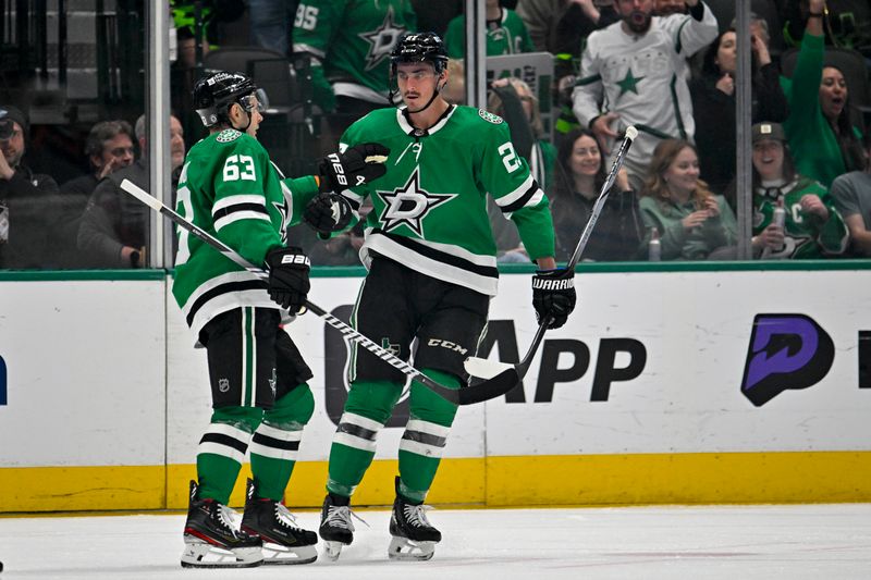 Apr 17, 2024; Dallas, Texas, USA; Dallas Stars left wing Mason Marchment (27) and Dallas Stars right wing Evgenii Dadonov (63) celebrates a goal scored by Marchment against the St. Louis Blues during the third period at the American Airlines Center. Mandatory Credit: Jerome Miron-USA TODAY Sports