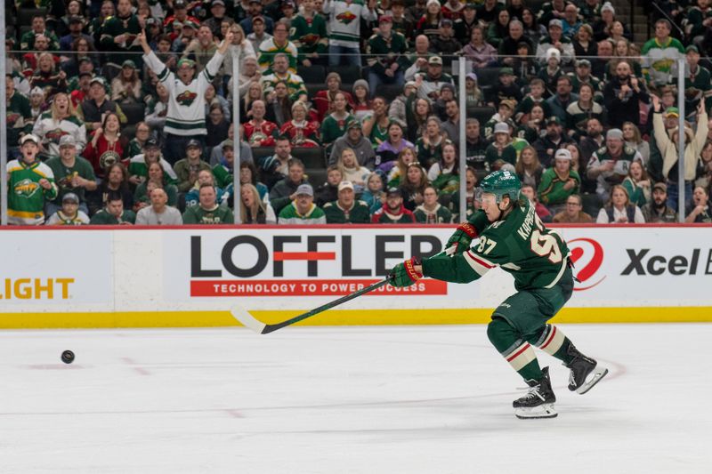 Mar 3, 2024; Saint Paul, Minnesota, USA; Minnesota Wild left wing Kirill Kaprizov (97) shoots and scores against the San Jose Sharks in the second period at Xcel Energy Center. Mandatory Credit: Matt Blewett-USA TODAY Sports