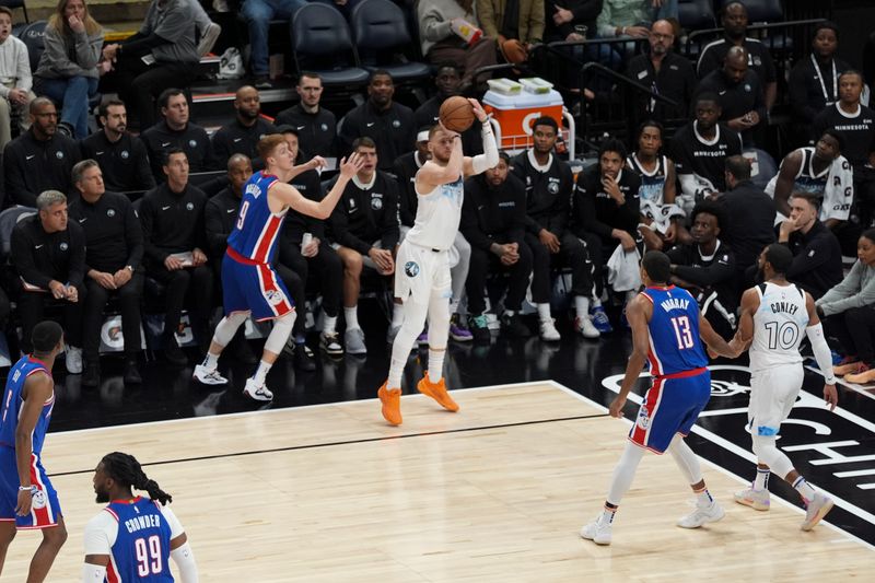 MINNEAPOLIS, MN -  NOVEMBER 27:  Donte DiVincenzo #0 of the Minnesota Timberwolves shoots a three point basket during the game against the Sacramento Kings on November 27, 2024 at Target Center in Minneapolis, Minnesota. NOTE TO USER: User expressly acknowledges and agrees that, by downloading and or using this Photograph, user is consenting to the terms and conditions of the Getty Images License Agreement. Mandatory Copyright Notice: Copyright 2024 NBAE (Photo by Jordan Johnson/NBAE via Getty Images)