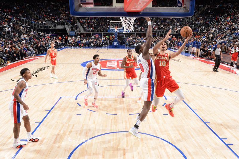 DETROIT, MI - FEBRUARY 3:  Zaccharie Risacher #10 of the Atlanta Hawks drives to the basket during the game against the Detroit Pistons on February 3, 2025 at Little Caesars Arena in Detroit, Michigan. NOTE TO USER: User expressly acknowledges and agrees that, by downloading and/or using this photograph, User is consenting to the terms and conditions of the Getty Images License Agreement. Mandatory Copyright Notice: Copyright 2025 NBAE (Photo by Chris Schwegler/NBAE via Getty Images)