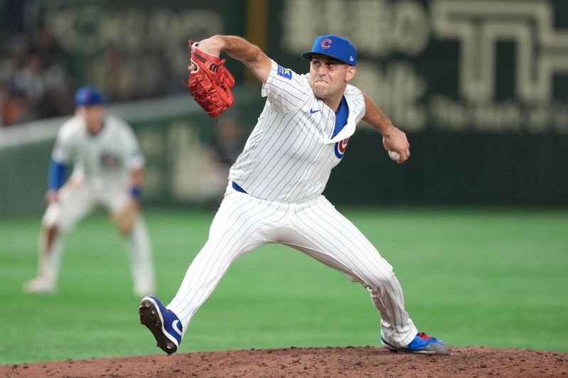 Mar 16, 2025; Bunkyo, Tokyo, Japan; Chicago Cubs pitcher Matthew Boyd (16) throws a pitch against the Yomiuri Giants during the ninth inning at Tokyo Dome. Mandatory Credit: Darren Yamashita-Imagn Images